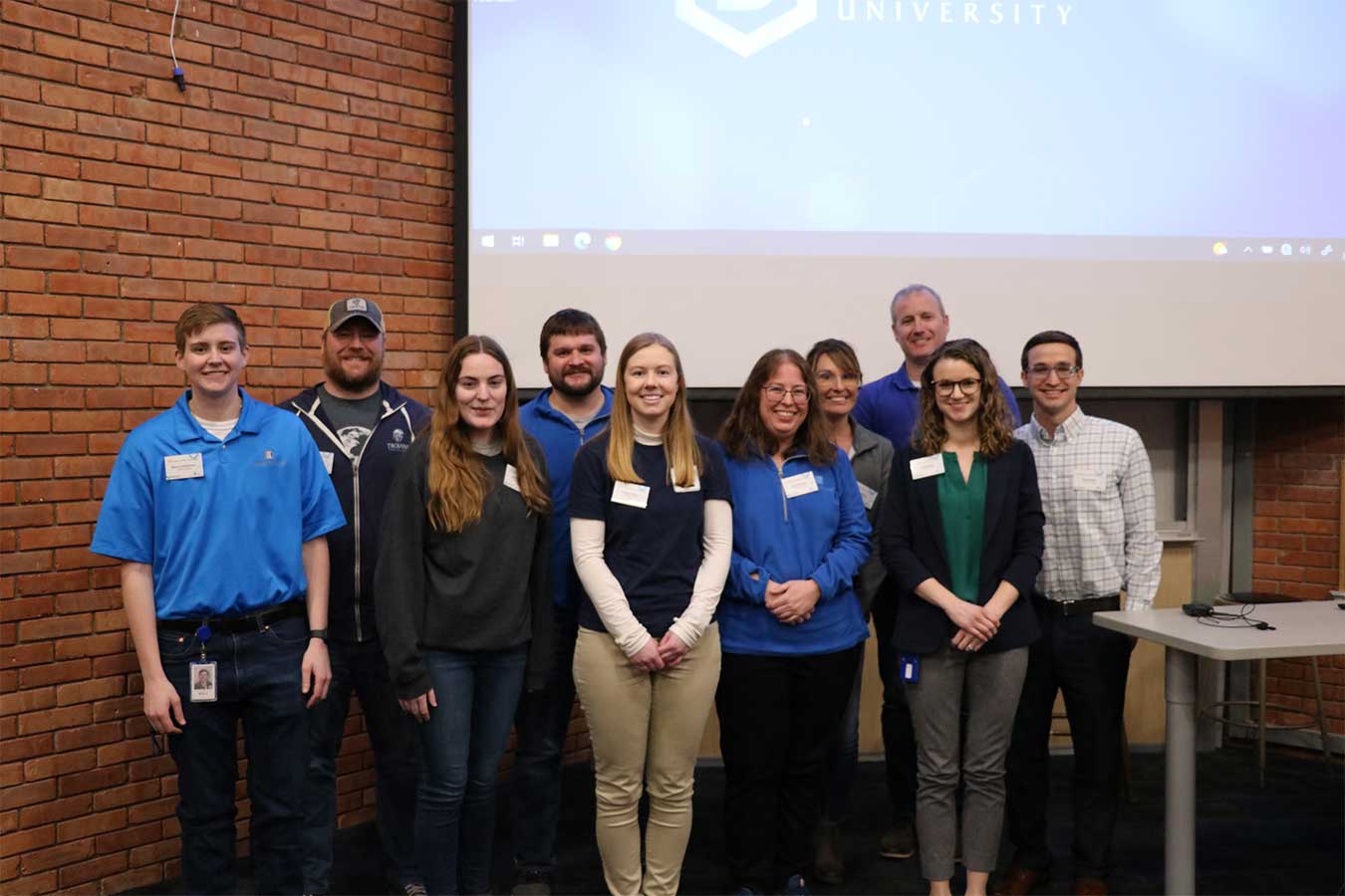 A team of CAPITAL Services employees, along with DSU faculty Dr. Austin O'Brien, judged last year's competition.
